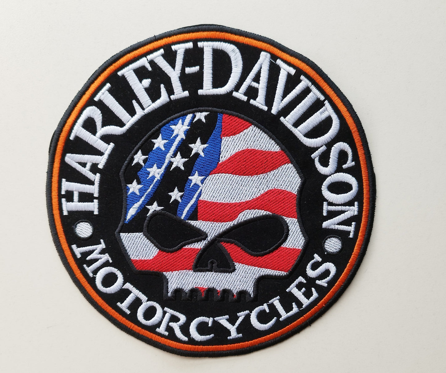 Piccola patch toppa SKULL HD Motorcycles scritta arancio, bandiera Americana, USA